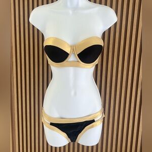 Luli Fama Gold and Black warrior spirit bikini set